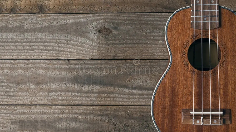 Красное дерево iz krasnogo dereva gavajskaya gitara otdyhaet na derevyannyh plankah 204827566 - Красное дерево
